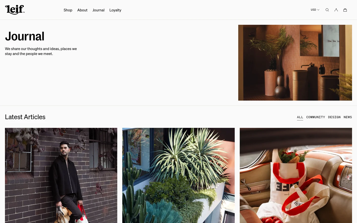 The desktop Journal page features a minimalist white background with a large 'Journal' headline and introductory text on the left, paired with a large lifestyle hero image of plants and vessels on the right. Below, a 'Latest Articles' section includes a horizontal navigation menu for categories like All, Community, Design, and News, followed by a grid of large, high-quality editorial images.