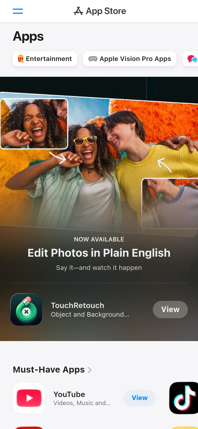 The mobile version presents a simplified layout with a white header containing the App Store logo and a horizontal scrolling pill menu for app categories like Entertainment and Apple Vision Pro Apps. The hero section features a large, full-width image for a featured app, followed by a vertical list of 'Must-Have Apps' with icons, descriptions, and 'View' buttons.