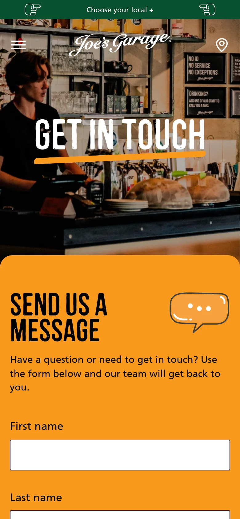 The mobile version displays a vertically stacked layout starting with a condensed hero image of the cafe interior and the 'GET IN TOUCH' heading. The contact form follows on a bright orange background, with the 'SEND US A MESSAGE' heading and speech bubble icon positioned above the input fields. The top navigation is simplified into a hamburger menu and a location selector.