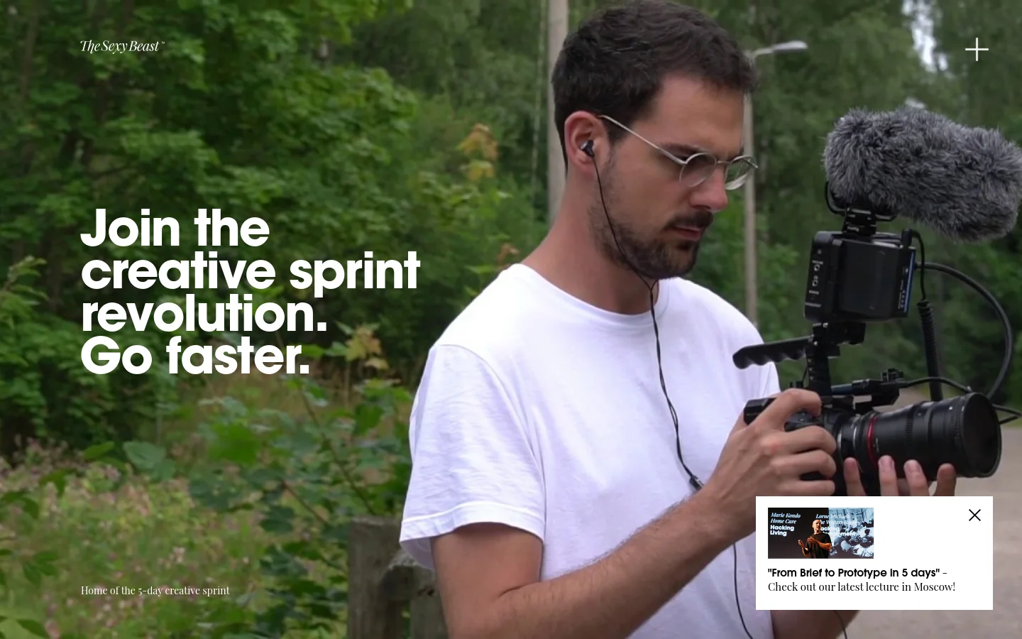 The desktop homepage features a large hero image of a man filming in a forest with the headline 'Join the creative sprint revolution. Go faster.' in bold white text. Below the hero section, a grid of case studies showcases client testimonials from WizzAir, Libratone, and Descomplica with accompanying images and 'See more' links.
