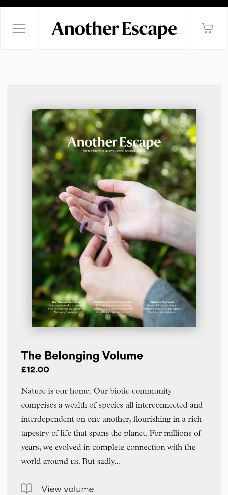 The mobile version presents a single-column vertical layout optimized for small screens. The featured product, 'The Belonging Volume,' is shown with a large cover image at the top, followed by its title, price, and description, with a hamburger menu and shopping cart icon in the header.