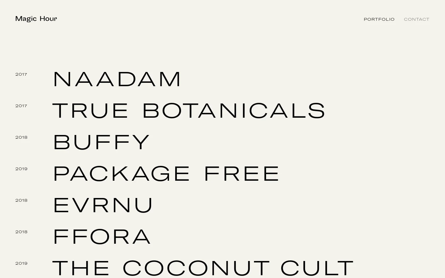 The desktop portfolio page features a minimalist design with a light grey background and black sans-serif typography. A vertical list displays company names like Naadam, True Botanicals, and Buffy, paired with their respective investment years on the left. The top navigation includes the Magic Hour logo on the left and 'PORTFOLIO' and 'CONTACT' links on the right.