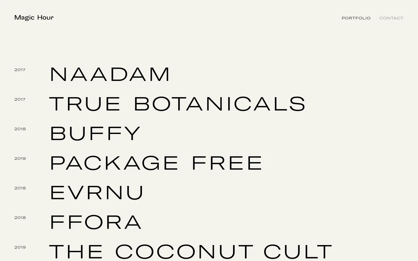 The desktop portfolio page features a minimalist design with a light grey background and black sans-serif typography. A vertical list displays company names like Naadam, True Botanicals, and Buffy, paired with their respective investment years on the left. The top navigation includes the Magic Hour logo on the left and 'PORTFOLIO' and 'CONTACT' links on the right.