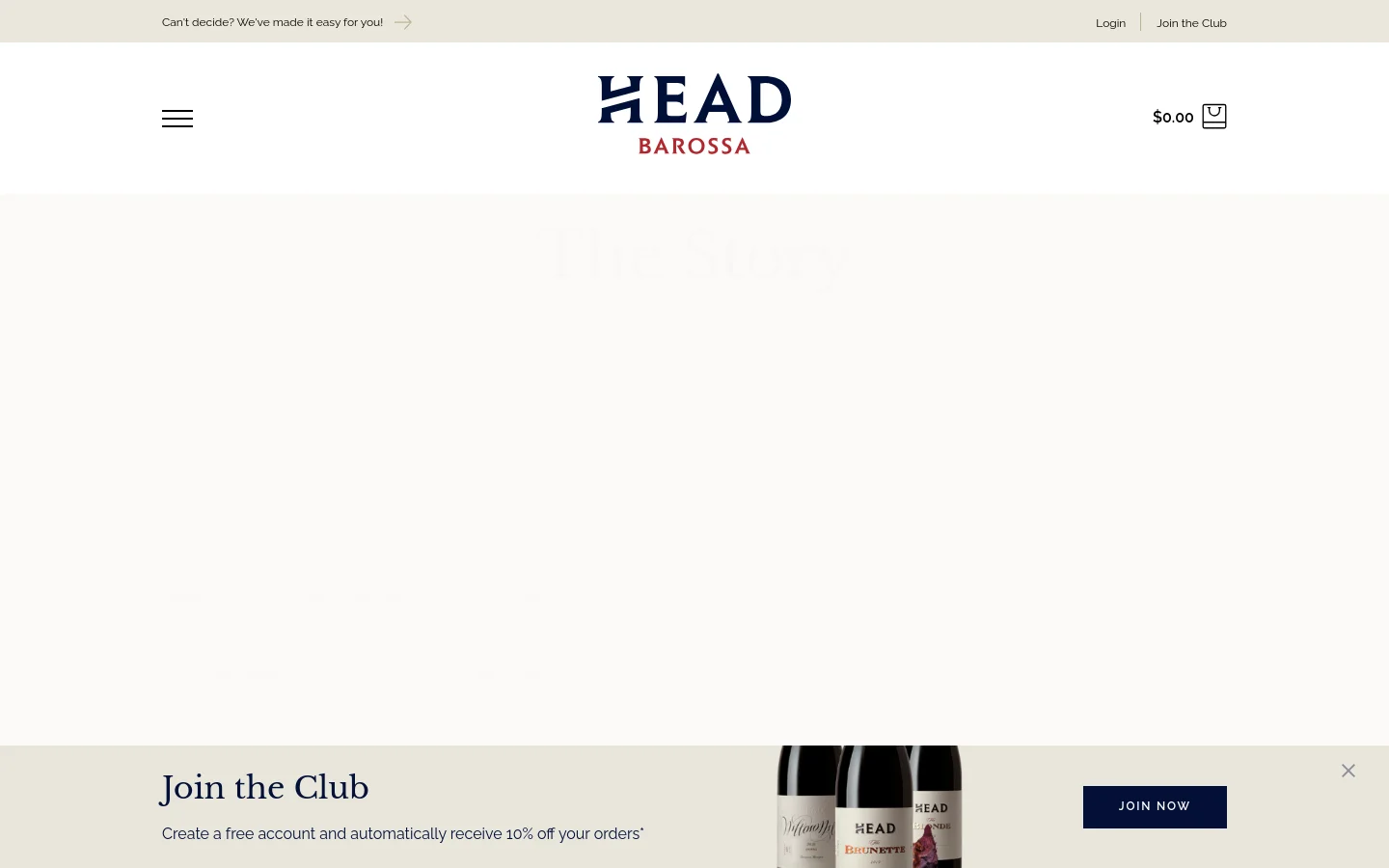 The desktop page features a minimalist white header with the 'HEAD BAROSSA' logo centered, a menu icon on the left, and a shopping bag on the right. Below the header, a large hero section displays the title 'The Story' in a serif font over a light background, followed by a collage of images including a winemaker standing in a vineyard and a close-up of dark grapes. A promotional banner at the bottom invites users to 'Join the Club' with a dark blue 'JOIN NOW' button.