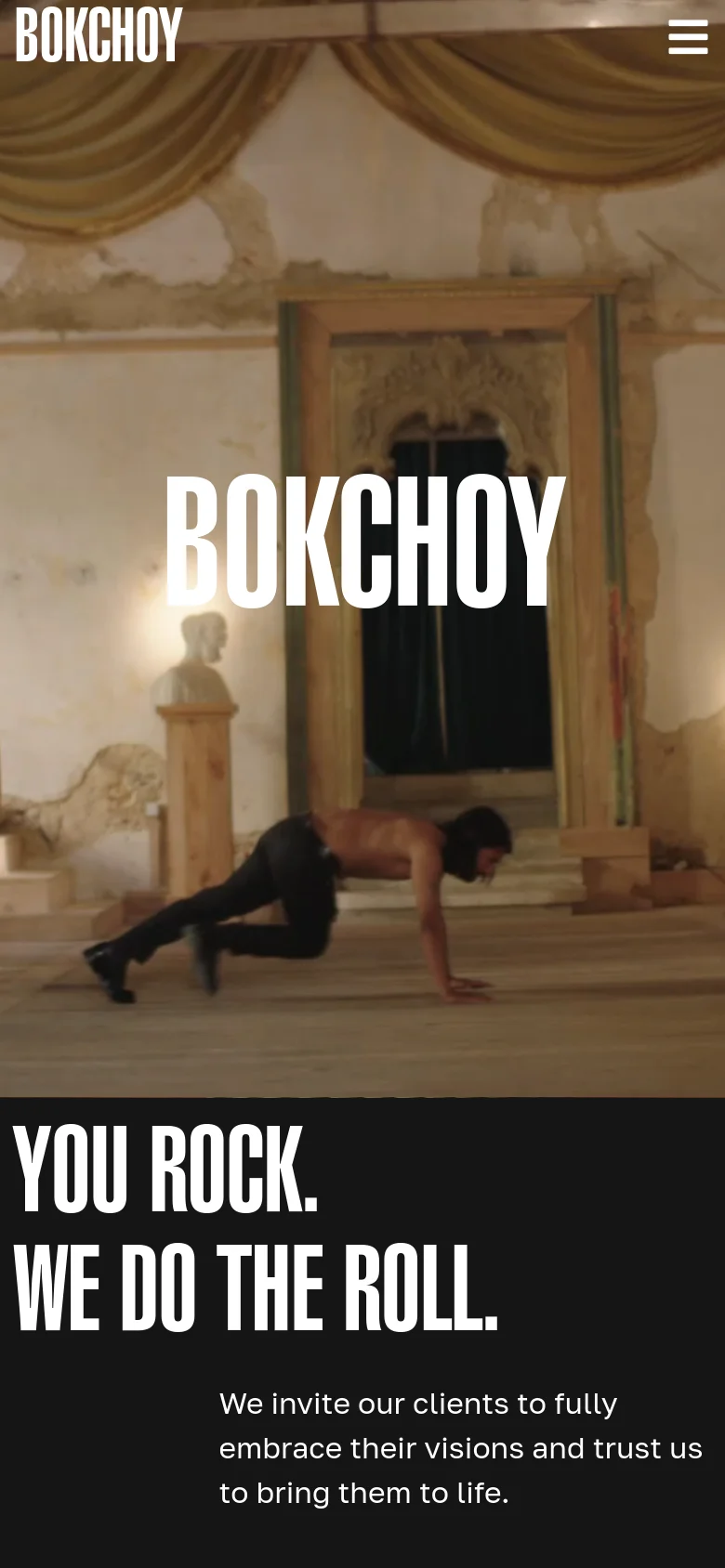 The mobile version presents a vertically stacked layout, starting with a large hero image of hands and white substance against a red background, with the 'BOKCHOY' logo at the top left and a hamburger menu icon at the top right. The main headline 'YOU ROCK. WE DO THE ROLL.' is prominently displayed in large white font against a dark background, followed by the studio's mission statement.