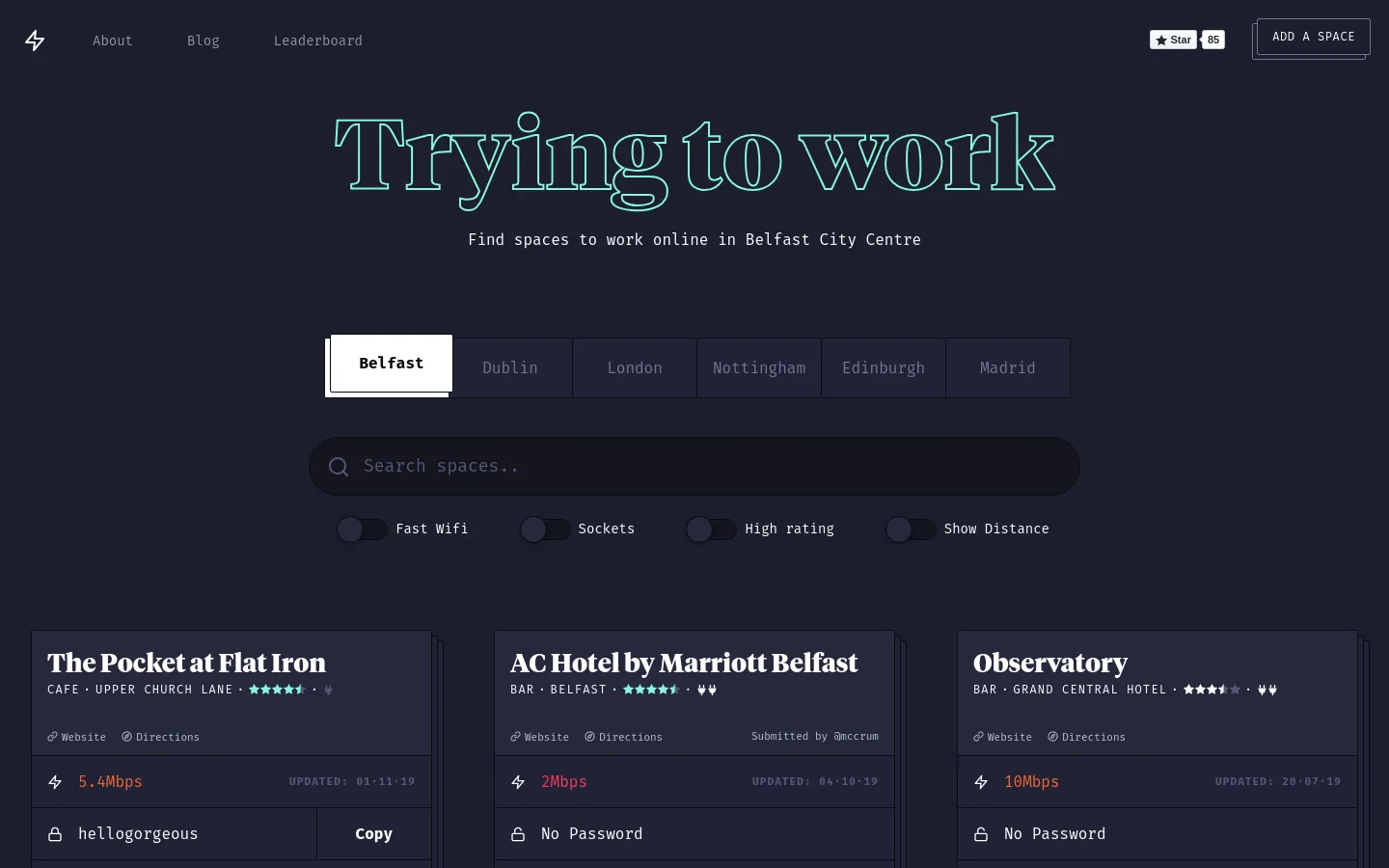 The desktop homepage features a dark theme with teal typography and a central hero section titled 'Trying to work' with a subheadline for Belfast. Below the title, a city selector menu and a search bar are followed by filter toggles for Wifi, Sockets, Rating, and Distance. The main content displays a grid of cards for various workspaces, each including details like type, location, speed, and links.