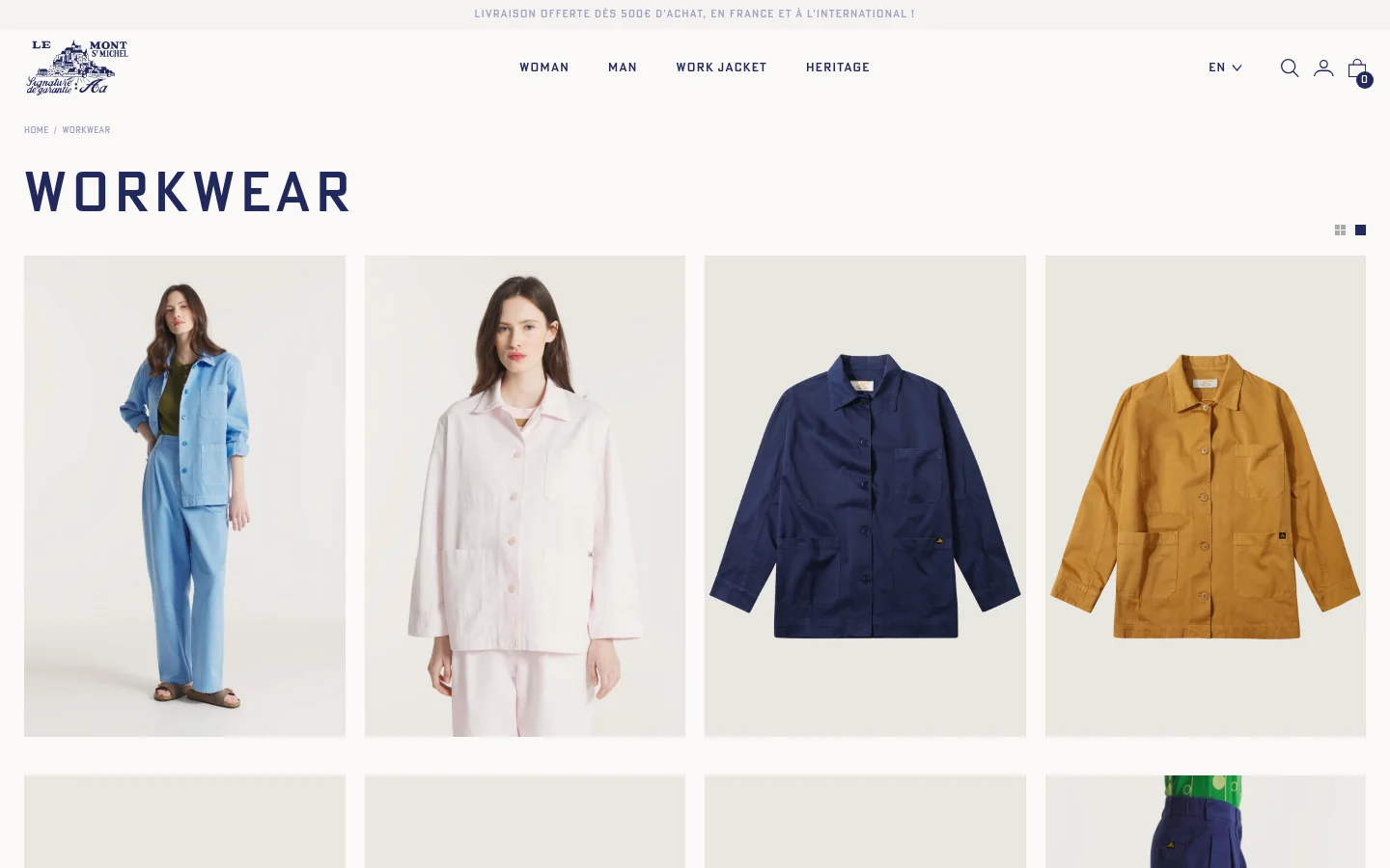 The desktop page for 'Workwear' features a clean, minimalist layout with a white background and dark navy typography. A grid of large product images displays various Gabardine work jackets in colors like azure, pink, navy, and mustard, with a navigation menu at the top including links for Woman, Man, Work Jacket, and Heritage. Each product listing includes the item name, price, and a 'Quick add to cart' option with available sizes.