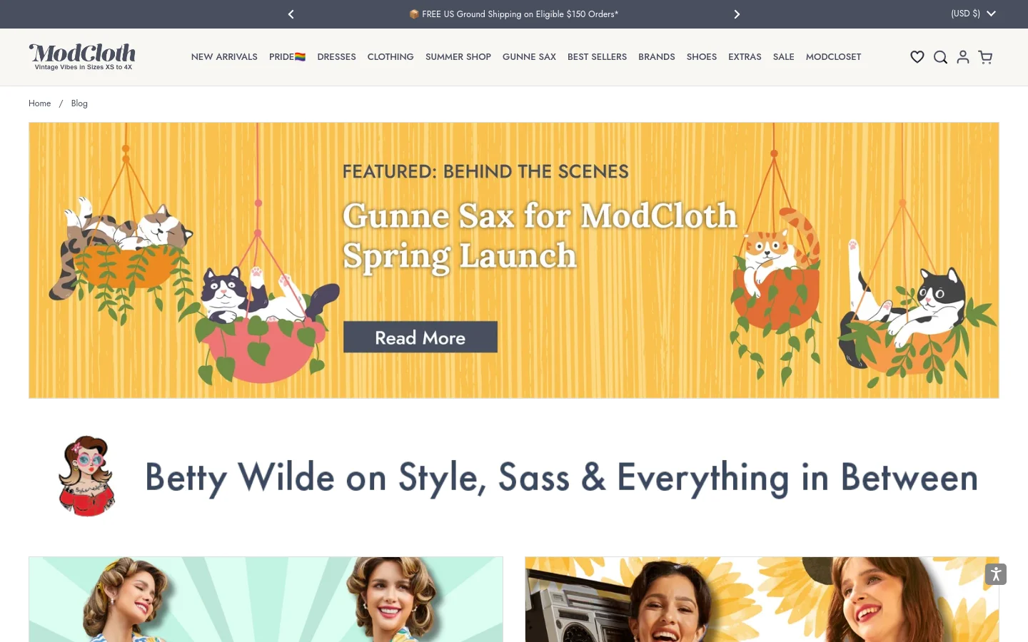 The ModCloth blog homepage features a large yellow hero banner with an illustration of cats in hanging planters and the headline 'Gunne Sax for ModCloth Spring Launch' with a 'Read More' button. Below the banner, a section titled 'Betty Wilde on Style, Sass & Everything in Between' includes a cartoon character icon. The layout is clean with a white background and a navigation bar at the top containing links like New Arrivals and Dresses.