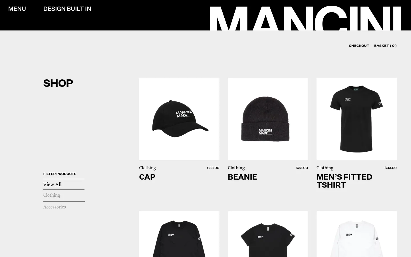 The desktop shop page features a minimalist design with a black header containing the white Mancini Made logo and menu options. A large 'SHOP' heading is on the left, next to a vertical product filter menu, while a grid of product cards displays items like a black cap, beanie, and t-shirt against a light grey background.