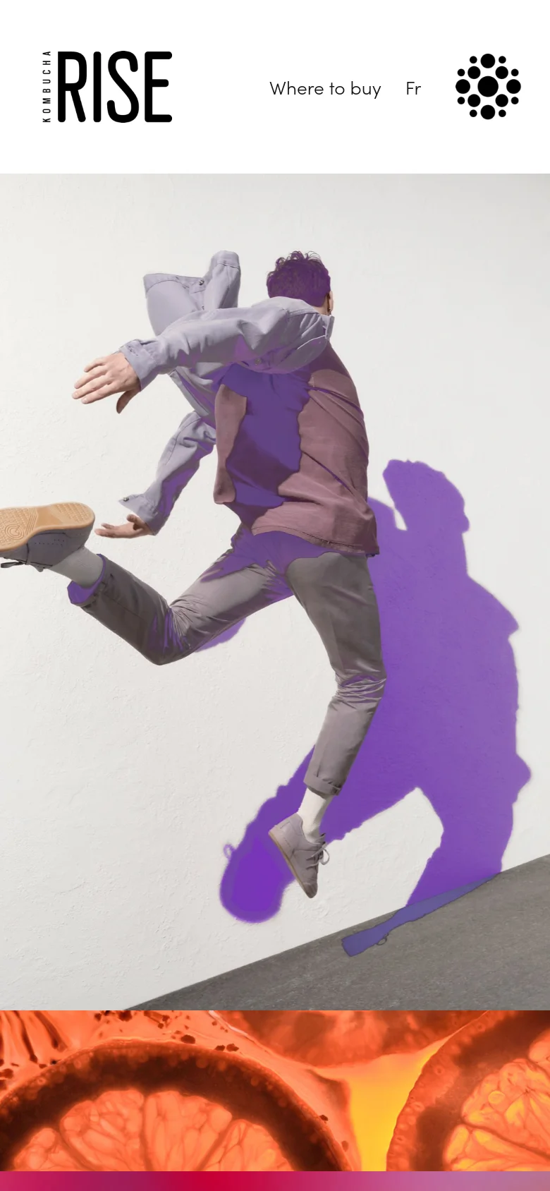 The mobile version presents a simplified, vertical stack of the content. The hero section prominently features the jumping person against a light background, followed by a close-up orange textured image. The navigation is condensed at the top with the logo, 'Where to buy' link, and language selector arranged horizontally.