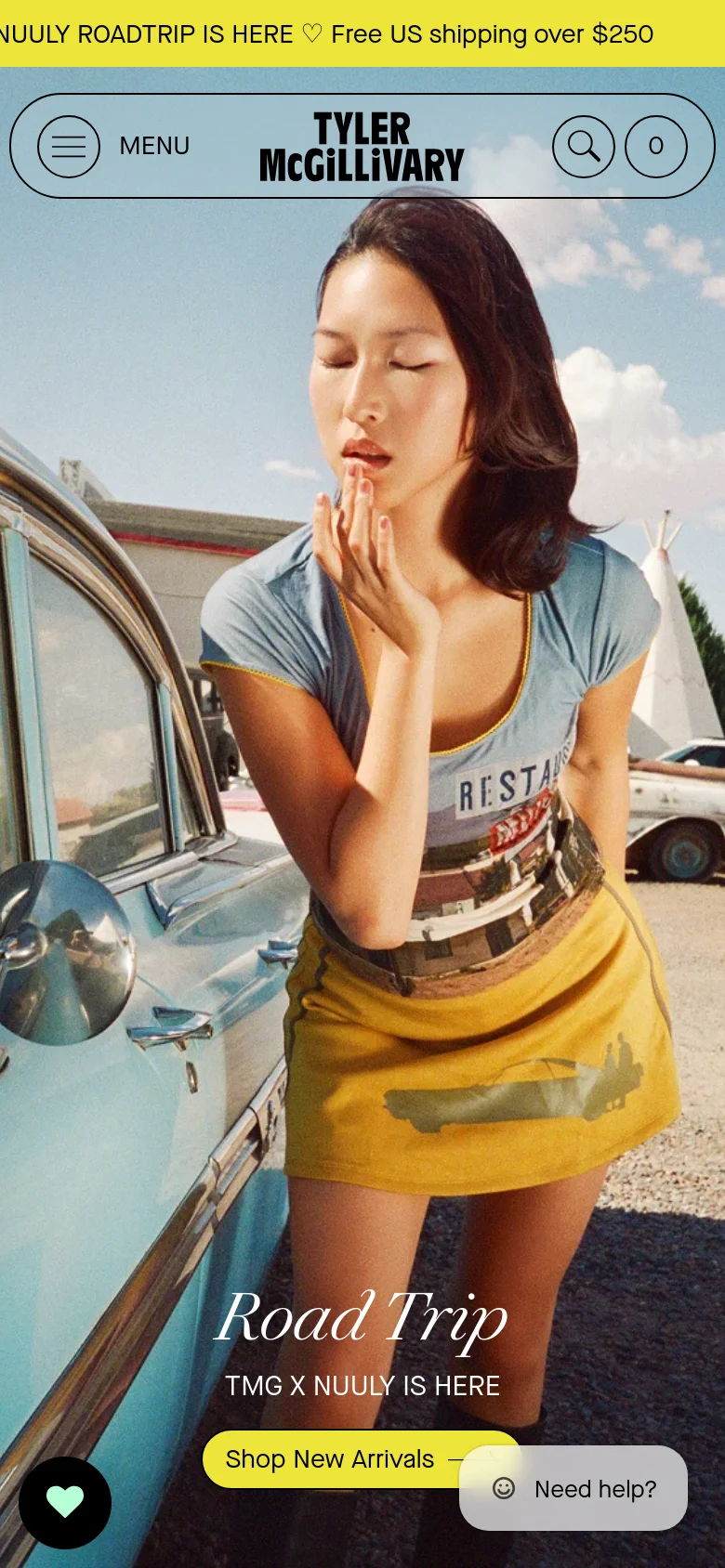 The mobile version displays a vertically oriented hero image of a woman in a blue top and yellow skirt, with the brand logo and menu icons stacked at the top. The 'Road Trip' headline and 'Shop New Arrivals' button are positioned in the lower half of the screen. A floating 'Need help?' button is visible in the bottom right corner.
