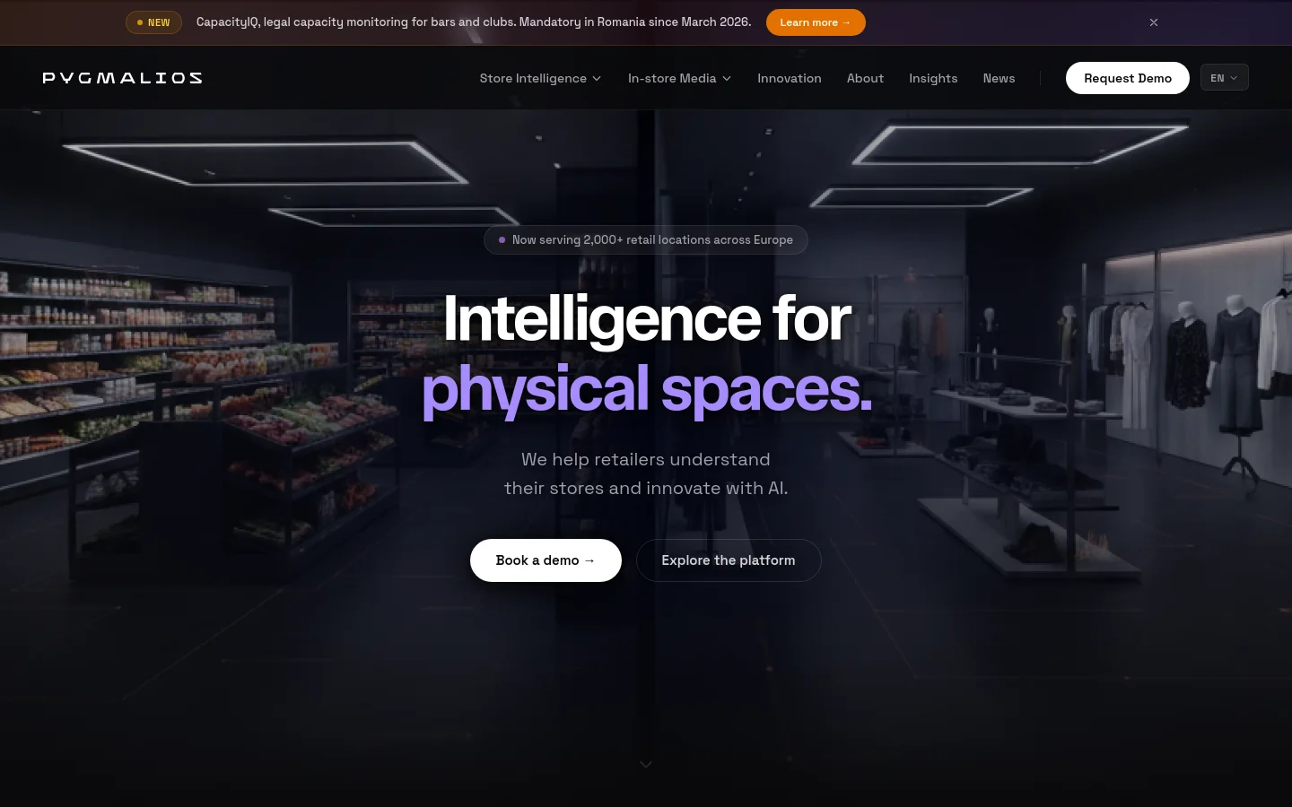 The desktop homepage features a dark, cinematic hero image of a retail store interior with the headline 'Intelligence for physical spaces.' Primary calls to action include 'Book a demo' and 'Explore the platform' buttons set against a dark background. A top navigation bar includes links for Store Intelligence, In-store Media, Innovation, About, Insights, and News, alongside a 'Request Demo' button.