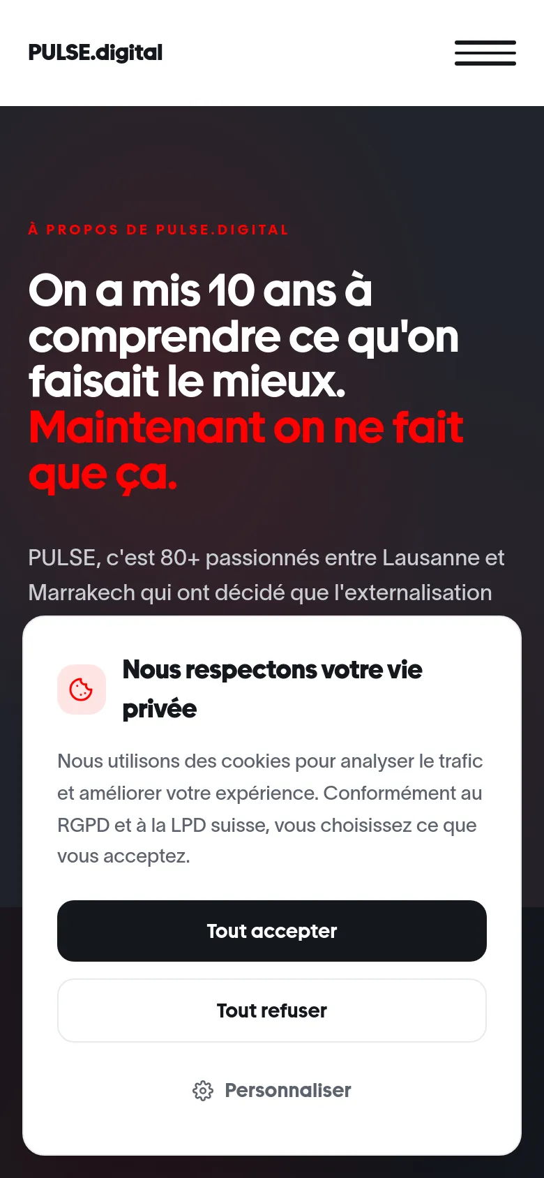 The mobile version shows a simplified layout with a hamburger menu icon on the right and the PULSE.digital logo on the left. The hero headline is centered and scaled down to fit the narrow screen, maintaining the white and red color scheme. A large cookie consent modal dominates the bottom half of the screen.