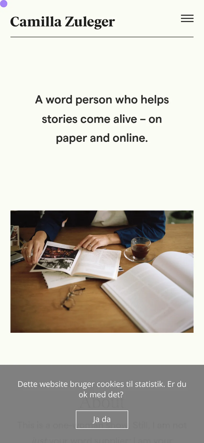 The mobile version maintains the cream background and minimalist aesthetic but uses a stacked layout. The navigation menu is condensed into a hamburger icon on the right side of the header. The hero headline and large image of hands with a book and coffee are centered and scaled to fit the narrower screen width.