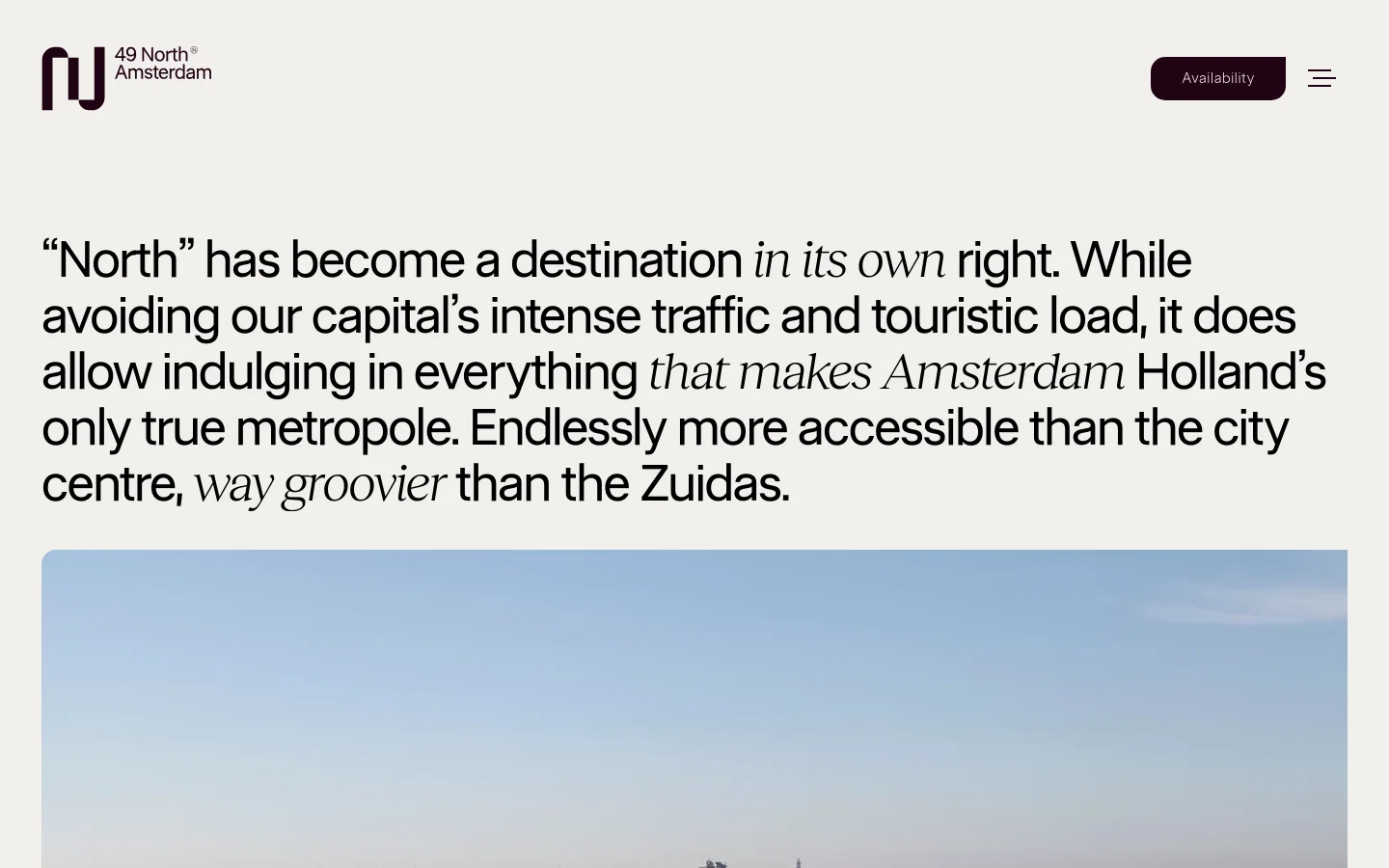 The desktop page features a minimalist white background with a large, serif-font headline about Amsterdam North. Below the text is a wide landscape hero image of a waterfront view under a clear sky, followed by sections on commuting accessibility with tabbed navigation for Car, Public, Boat, and Area.