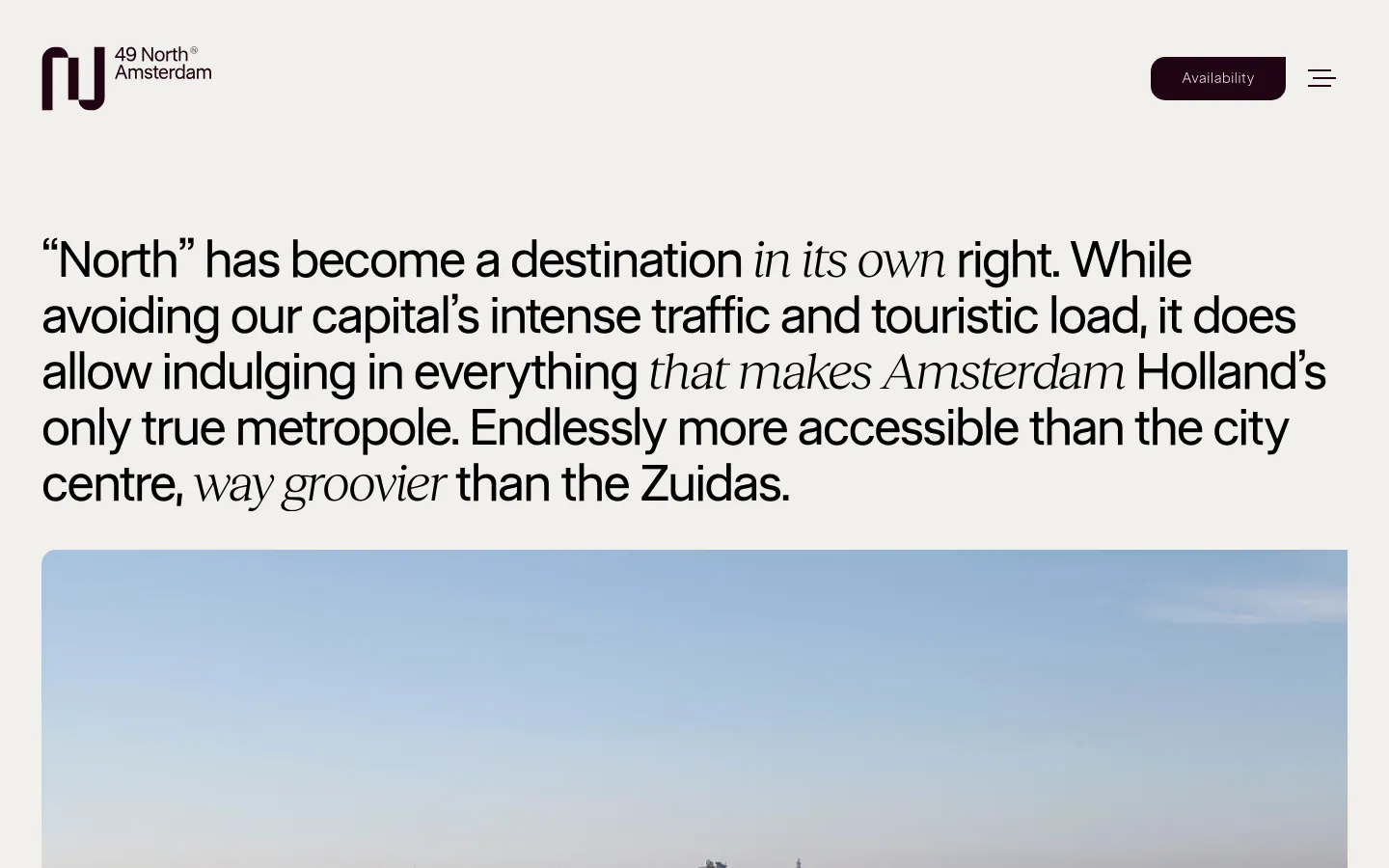 The desktop page features a minimalist white background with a large, serif-font headline about Amsterdam North. Below the text is a wide landscape hero image of a waterfront view under a clear sky, followed by sections on commuting accessibility with tabbed navigation for Car, Public, Boat, and Area.