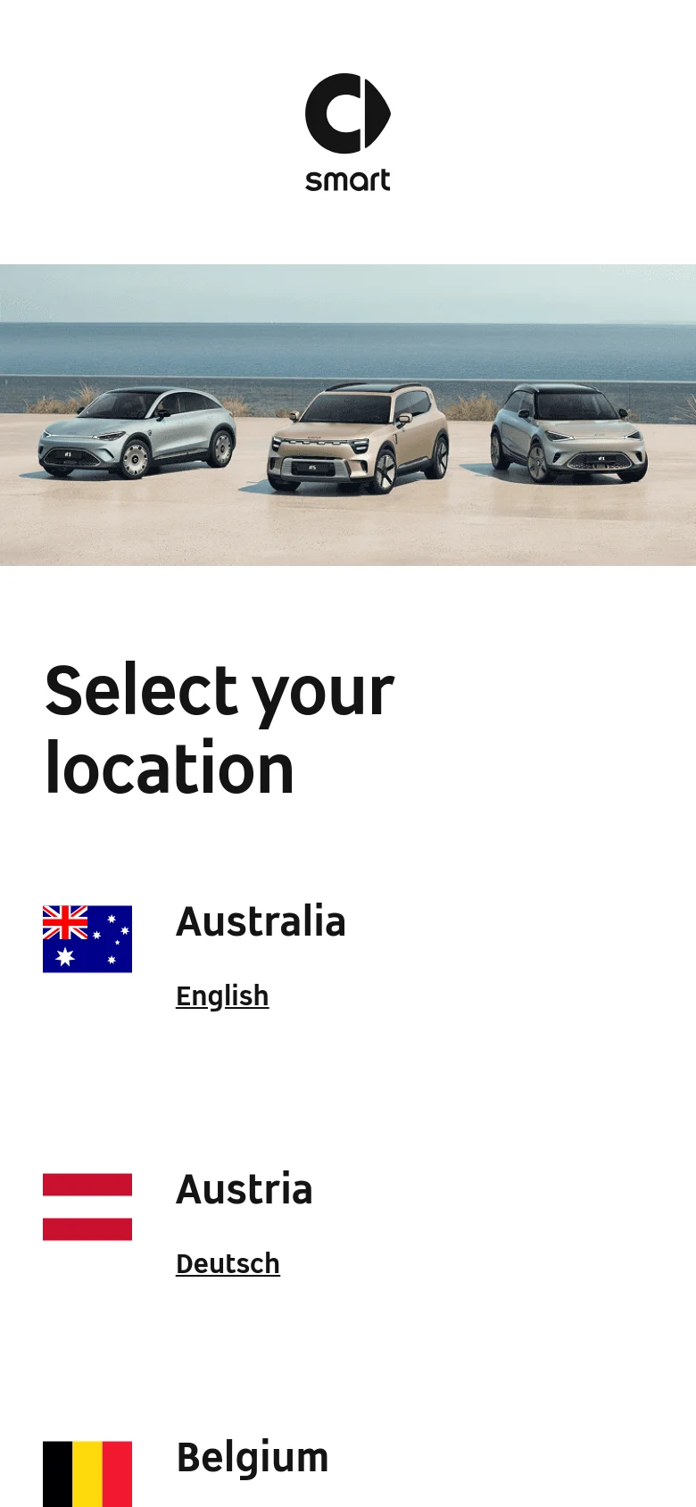 The mobile version maintains the same layout but scales the hero image and text for a vertical screen. The three cars are shown in a narrower view above the 'Select your location' headline, and the country list, including Australia and Austria, is stacked vertically for easy scrolling.