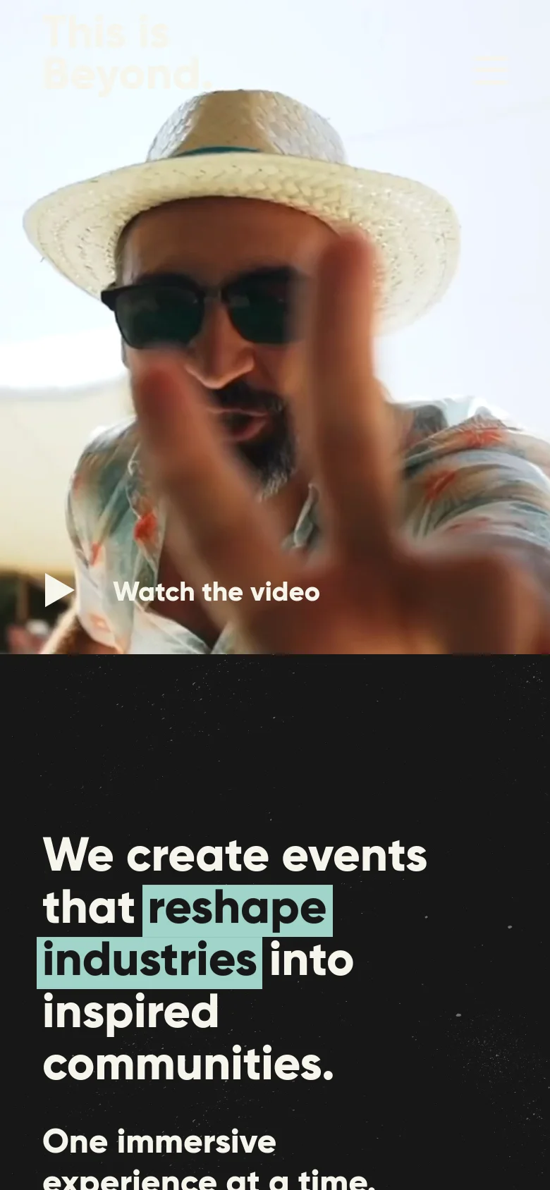 The mobile version presents a vertically stacked layout, starting with a full-width hero image of a man in a straw hat and sunglasses. Below the image, the headline 'We create events that reshape industries into inspired communities' is displayed in large white text against a dark, starry background. The navigation is condensed into a hamburger menu at the top right.