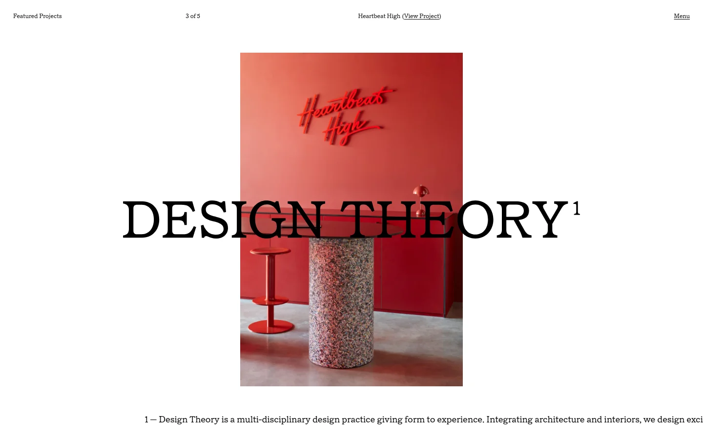 Design Theory homepage featuring a minimalist editorial layout with large serif typography. A central hero image showcases a red interior with a granite pedestal table and neon signage, followed by a featured projects section with a large image slider and clean whitespace.