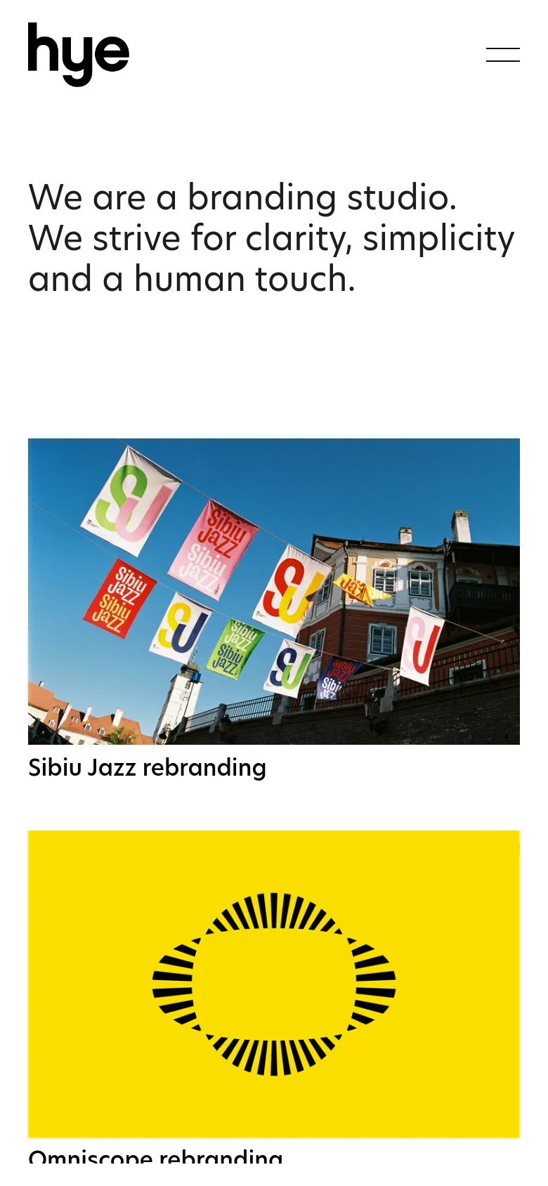 The mobile version uses a simplified layout with a large 'hye' logo and a hamburger menu icon at the top. The main headline and hero image of colorful flags are stacked vertically, followed by project titles and images in a single-column scrollable format.