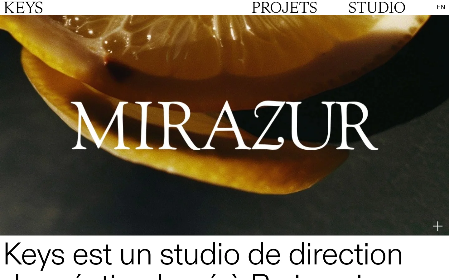 The desktop homepage features a minimalist design with a large hero image of orange slices and the word 'MIRAZUR' in white serif typography. A clean navigation bar at the top includes the brand name 'KEYS' on the left and links for 'PROJETS', 'STUDIO', and 'EN' on the right. Below the hero section, a large black serif heading introduces the studio's mission against a white background.