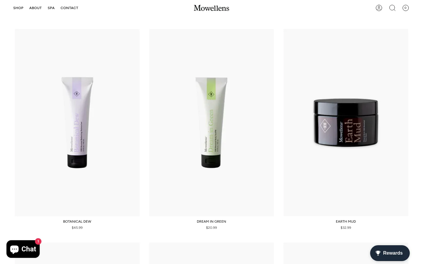The desktop shop page features a clean, minimalist layout with a white background and a top navigation menu containing links for Shop, About, Spa, and Contact. A grid of skincare products is displayed, including Botanical Dew, Dream in Green, and Earth Mud, each shown with a large product image, name, and price. The design uses a neutral color palette with black text and subtle grey accents.