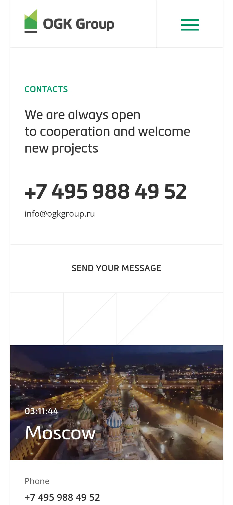 The mobile version presents a simplified vertical layout with the OGK Group logo and a hamburger menu at the top. The 'Contacts' heading and primary phone number and email are centered in a clean, white space. The bottom of the screen transitions into a large photographic background of Moscow at night.