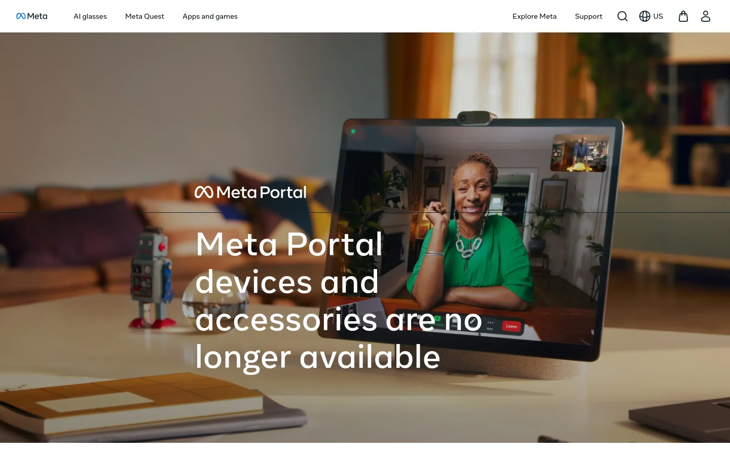 The desktop homepage features a large hero image of a Meta Portal device on a table, showing a woman on a video call. A large white headline reads 'Meta Portal devices and accessories are no longer available' over a dark semi-transparent overlay. The top navigation bar includes the Meta logo, links for AI glasses, Meta Quest, and apps, alongside search, language, and shopping icons.