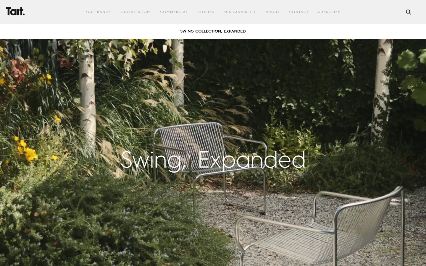The desktop homepage features a minimalist white navigation bar with the Tait logo and links like 'Our Range' and 'Commercial'. A large hero section displays a high-quality video or image of stainless steel outdoor furniture in a lush garden setting with the headline 'Swing, Expanded'. Below, content sections use large typography and high-resolution imagery to highlight news about the LUSTRE exhibition and the Swing Collection.