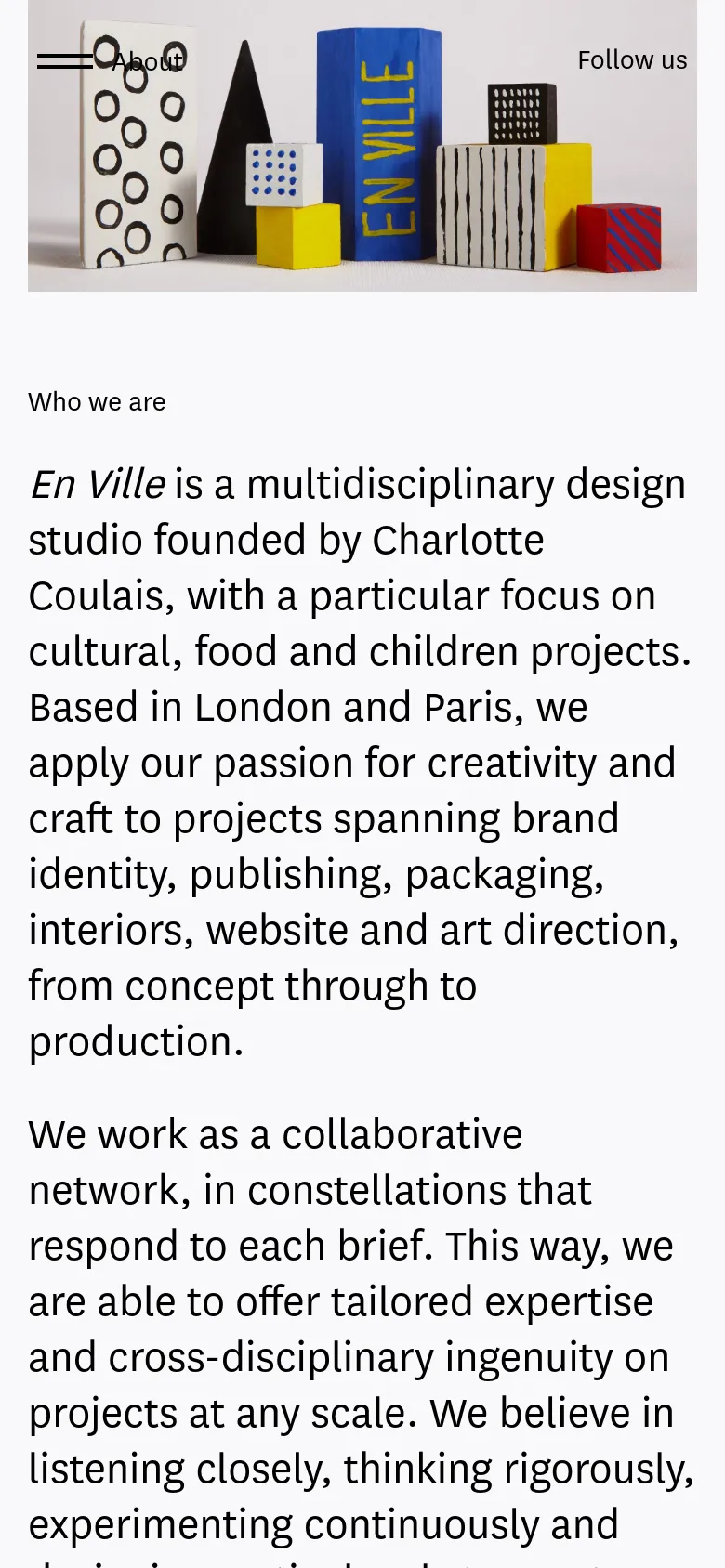 The mobile version maintains the minimalist aesthetic but stacks the content vertically for a single-column view. The hero image of geometric blocks appears at the top, followed by the 'Who we are' text, with the side navigation elements integrated into a more compact, scrollable layout.