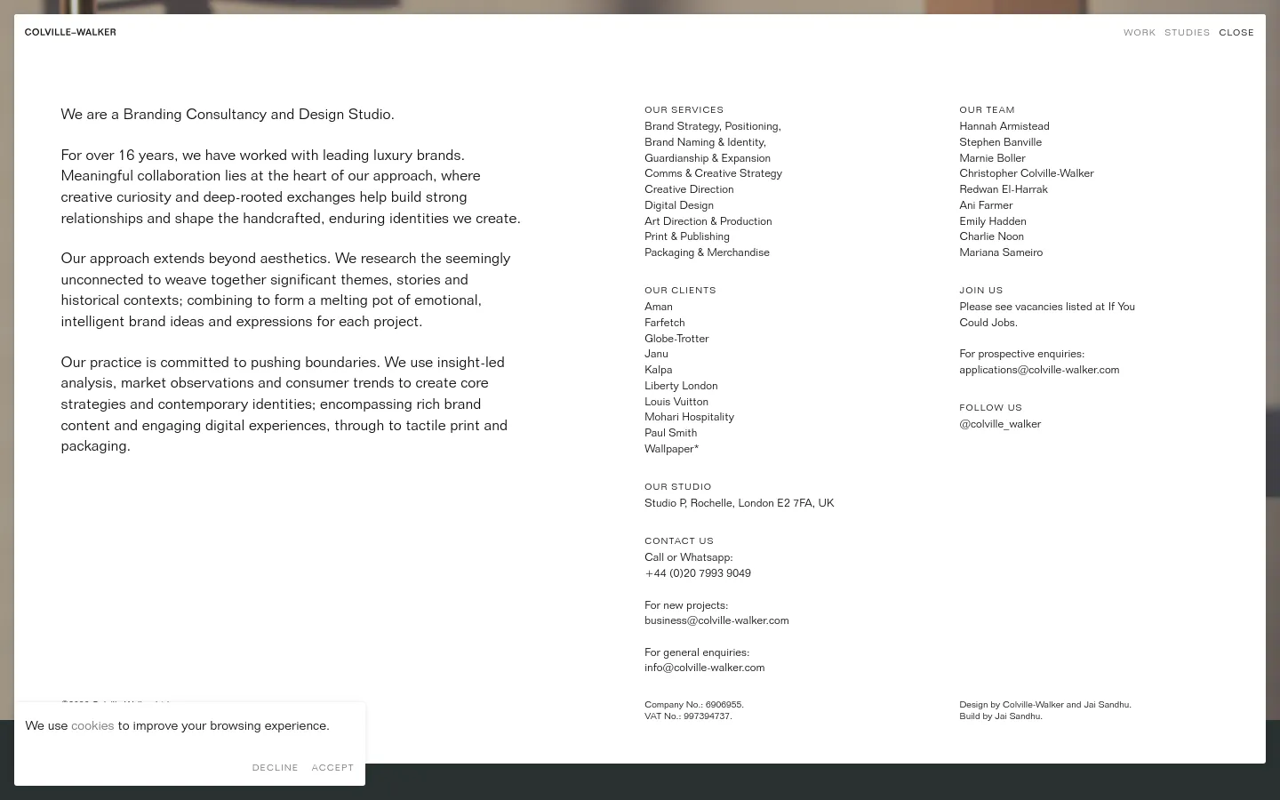 The desktop version features a minimalist, high-end design with a clean white background and black serif typography. The layout is split into two columns: a wide left column containing a detailed mission statement about the branding consultancy, and a narrower right column organized into sections for Services, Clients, Studio, Team, and Contact information. A subtle, large-scale grayscale background image of a textured surface provides a sophisticated backdrop.
