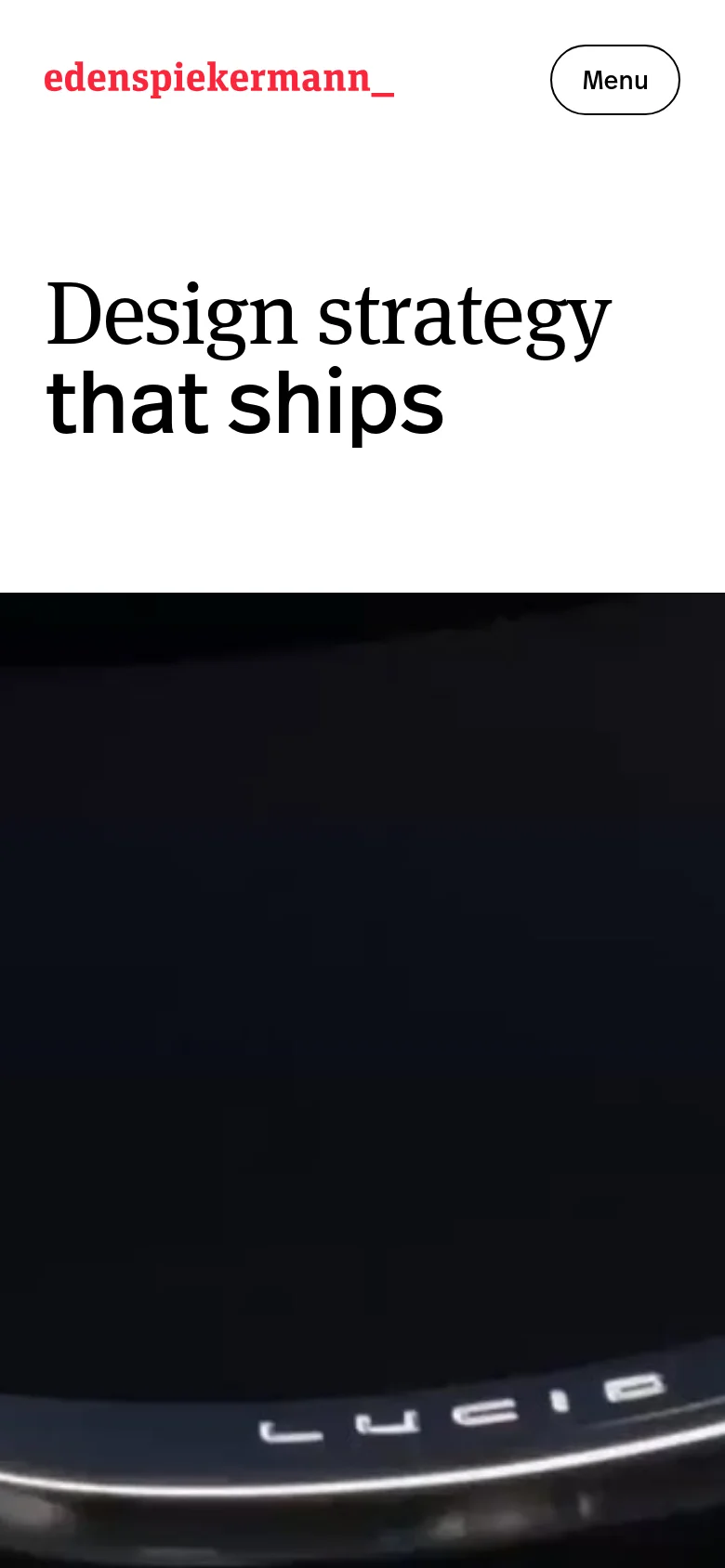 The mobile version simplifies the layout with a white header containing the red logo and a pill-shaped 'Menu' button on the right. The large serif headline 'Design strategy that ships' is stacked vertically above a dark, immersive hero image.
