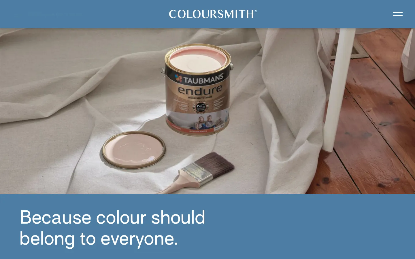 The desktop About page features a blue header with the Coloursmith logo and a hamburger menu. A large hero image shows a Taubmans paint can, an open lid with pink paint, and a paintbrush resting on white fabric over a wooden floor, followed by a large blue section with the headline 'Because colour should belong to everyone.'