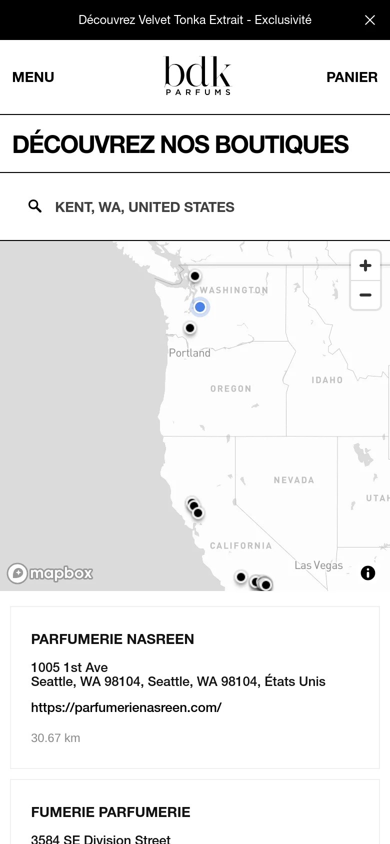 The mobile version maintains the white and grey aesthetic but uses a stacked layout. The header includes a hamburger menu and the brand logo, followed by the large 'DÉCOUVREZ NOS BOUTIQUES' title, a search bar, an interactive map, and a vertical list of boutique locations below the map.