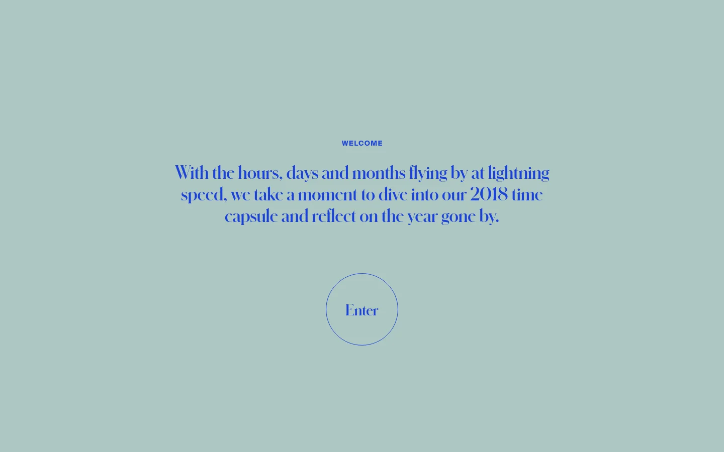 A minimalist landing page with a light sage green background. Centered blue text reads 'WELCOME' followed by a paragraph about the 2018 time capsule, with a large circular 'Enter' button at the bottom. Social media icons for Dribbble, Twitter, and Instagram are located in the top left corner.