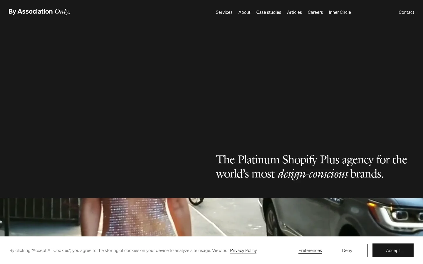 The desktop homepage features a minimalist dark design with white serif typography. A large hero section displays the headline 'The Platinum Shopify Plus agency for the world’s most design-conscious brands' over a wide, cinematic image of a person in a sequined outfit next to a car. A top navigation menu includes links for Services, About, Case studies, Articles, Careers, Inner Circle, and Contact.