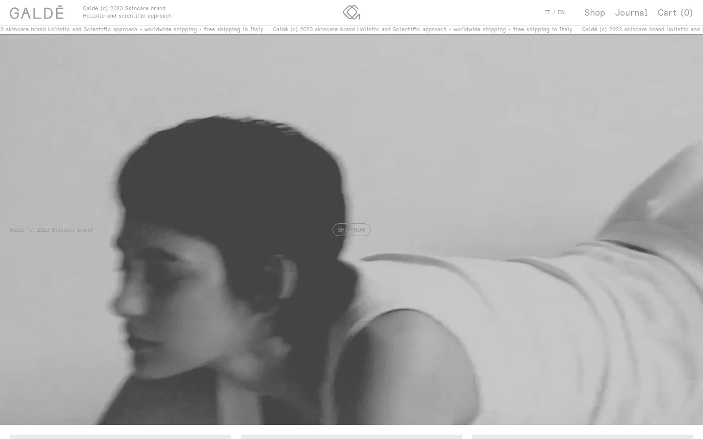 The desktop homepage features a minimalist design with a large, grayscale hero image of a person and a central 'SHOP NOW' button. The navigation bar at the top includes the brand logo, language options, and links for Shop, Journal, and Cart. Below the hero section, a 'Barrier Balancing Collection' is showcased with a clean layout of product images and descriptions.