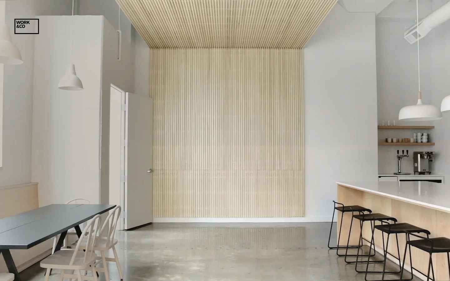 The desktop page features a minimalist white background with a large hero image of a modern, bright office space with light wood slats and pendant lights. Below the hero, a testimonial from Fast Company is displayed in large black serif text, followed by 'Open Roles' sections for Technology, Product Management, and Design, each containing job listings in a clean grid layout.