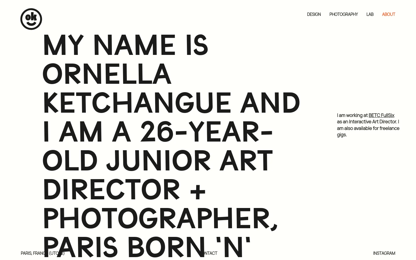 The desktop About page features a minimalist white background with large, bold black typography as the primary visual element. A navigation menu is located at the top right, and a small smiley face logo sits at the top left. The layout uses significant whitespace, with a brief professional bio on the right side and contact/social links at the bottom.
