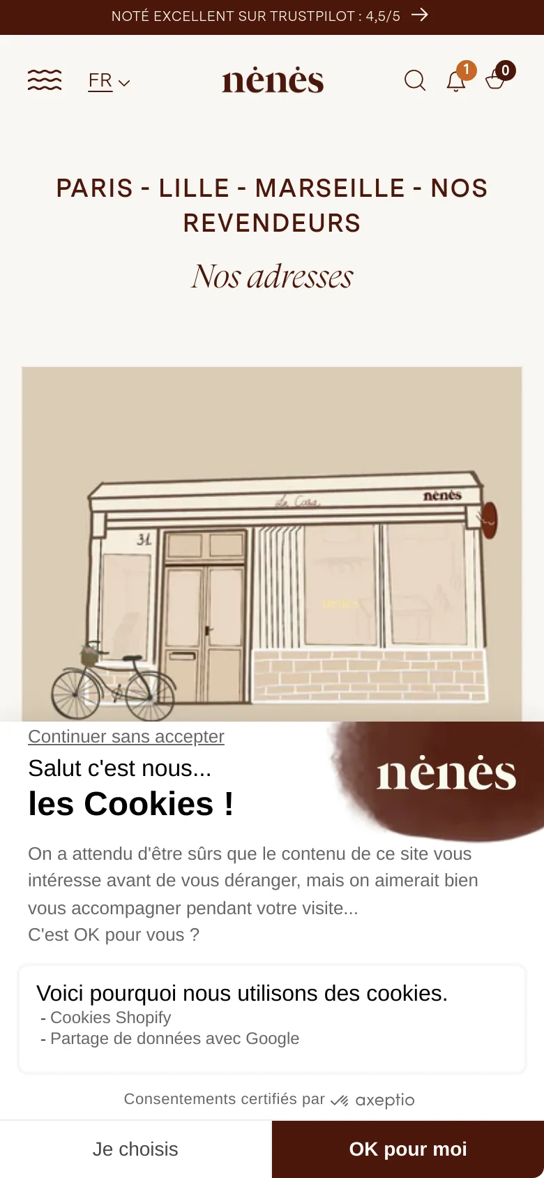 The mobile version presents a single-column vertical layout optimized for small screens. The header and main title 'Nos adresses' are centered, and the large boutique illustration spans the width of the screen. The cookie consent banner is more prominent, covering the bottom half of the viewport with large buttons.