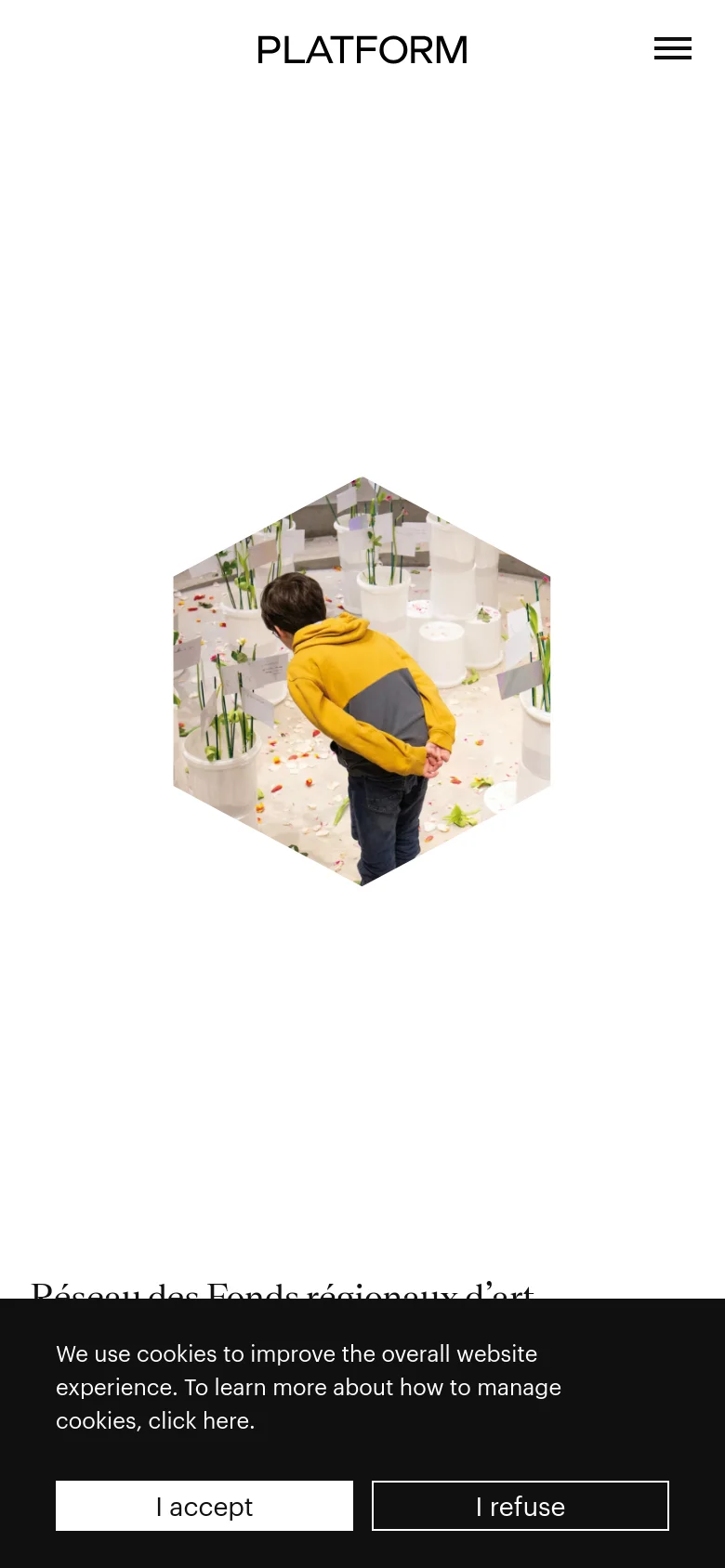 The mobile version simplifies the layout, centering the large hexagonal hero image and the 'PLATFORM' logo. The navigation is condensed into a hamburger menu icon at the top right, and a cookie consent banner occupies the bottom of the screen.
