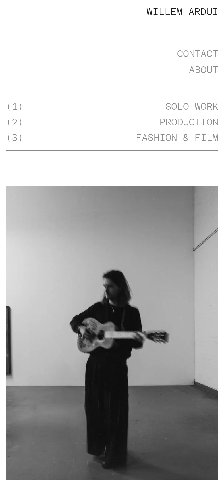 The mobile version maintains the minimalist aesthetic but rearranges the content into a vertical stack. The navigation links are listed centrally, and the large black and white portrait of the musician occupies the lower portion of the screen, creating a streamlined single-column layout.