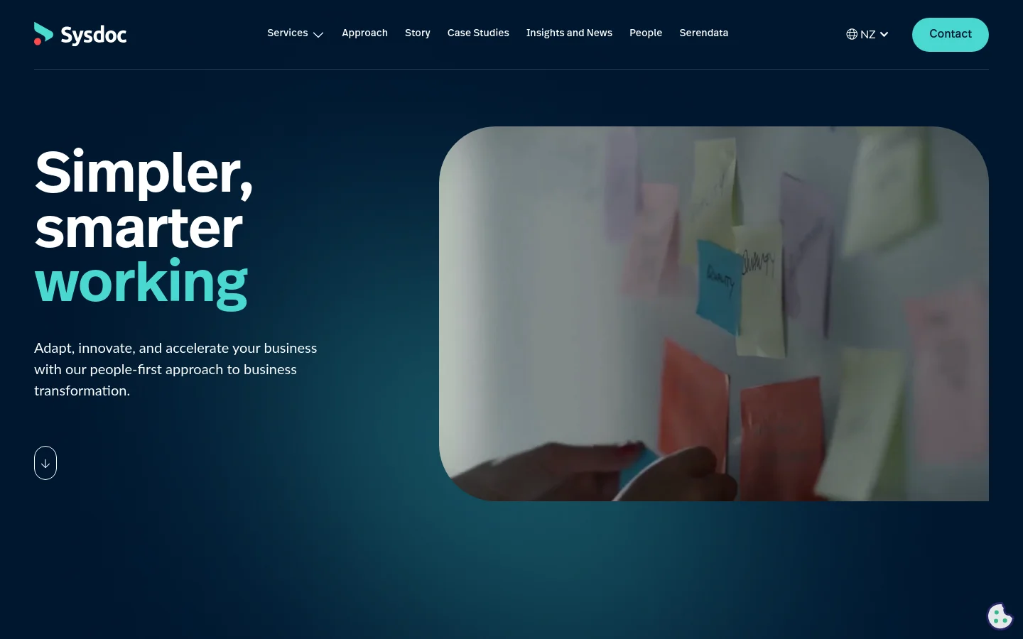 The desktop homepage features a dark navy background with a large hero section. On the left, bold white and teal text reads 'Simpler, smarter working' above a subheadline about business transformation. To the right is a large, rounded image of hands placing colorful sticky notes on a glass wall, and a small downward arrow icon sits in the bottom left.