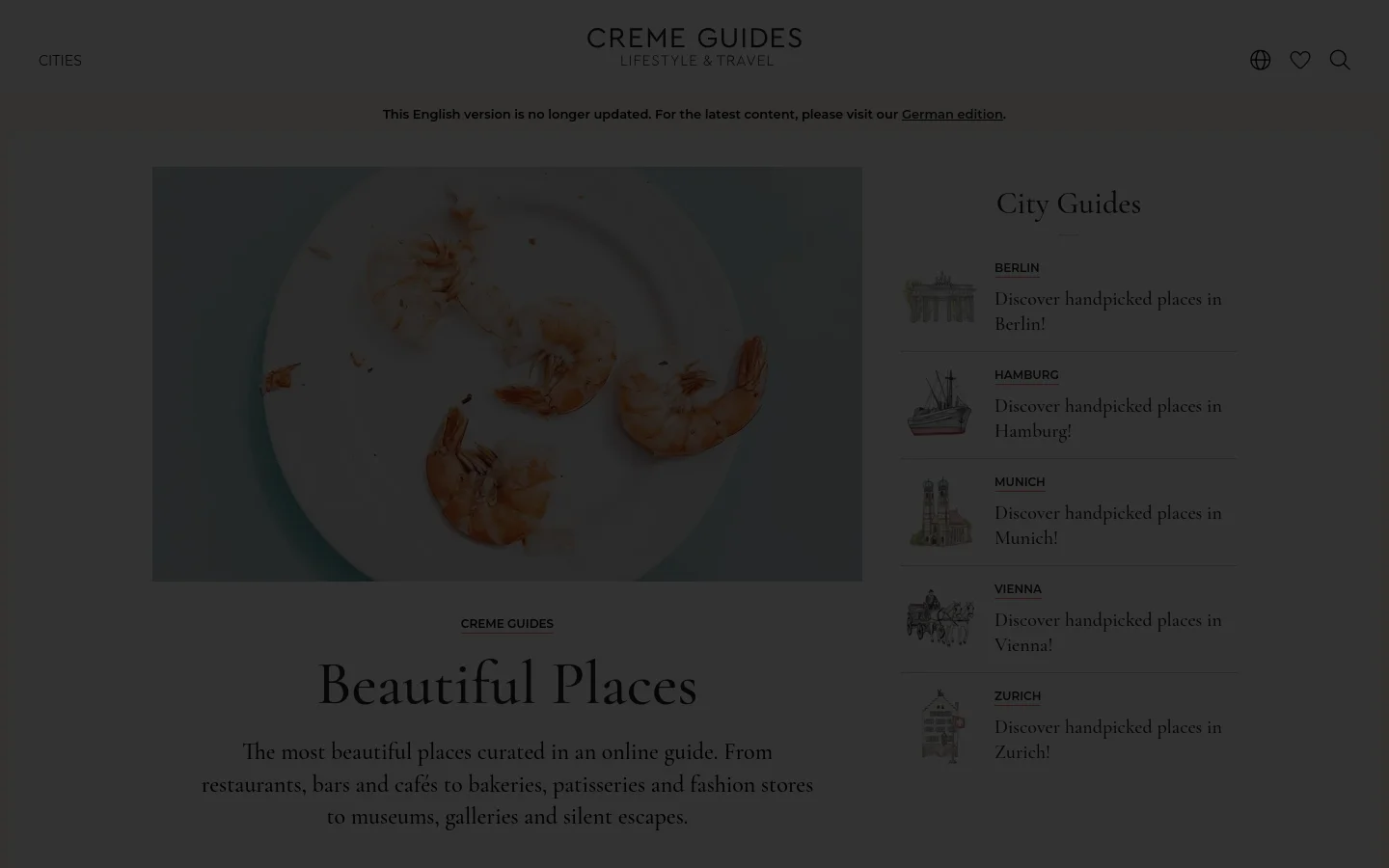 The desktop homepage features a minimalist design with a large hero image of shrimp on a white plate. Below the image, the headline 'Beautiful Places' is centered above a brief description, followed by a 'City Guides' section with a list of cities including Berlin, Hamburg, Munich, Vienna, and Zurich, each accompanied by a small line drawing.