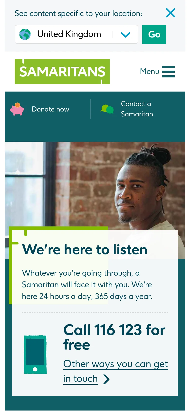 The mobile version presents a simplified, vertical layout starting with a location selector banner at the top. The header features the Samaritans logo, a hamburger menu icon, and two large teal buttons for 'Donate now' and 'Contact a Samaritan'. The hero section follows, with the 'We're here to listen' text box and call-to-action overlaying a portrait of a man.