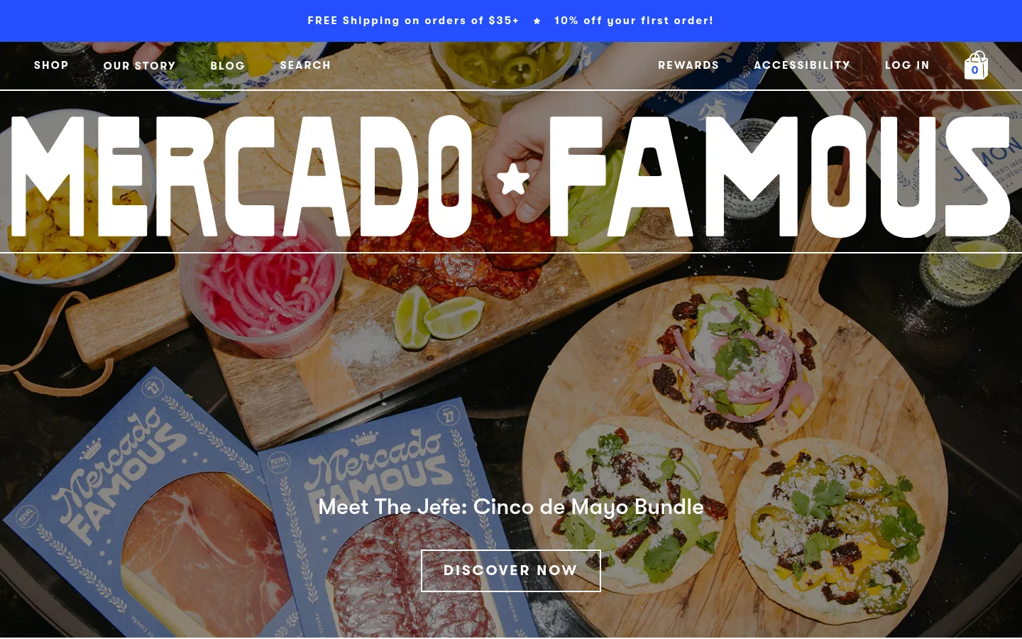 The desktop homepage features a large hero image of a Spanish-style spread with meats, limes, and tacos on wooden boards. A white banner at the top announces free shipping and a discount, while the main heading 'MERCADO FAMOUS' is overlaid in large white text. Below the hero, a 'Meet The Jefe' promotion includes a 'DISCOVER NOW' call to action button.