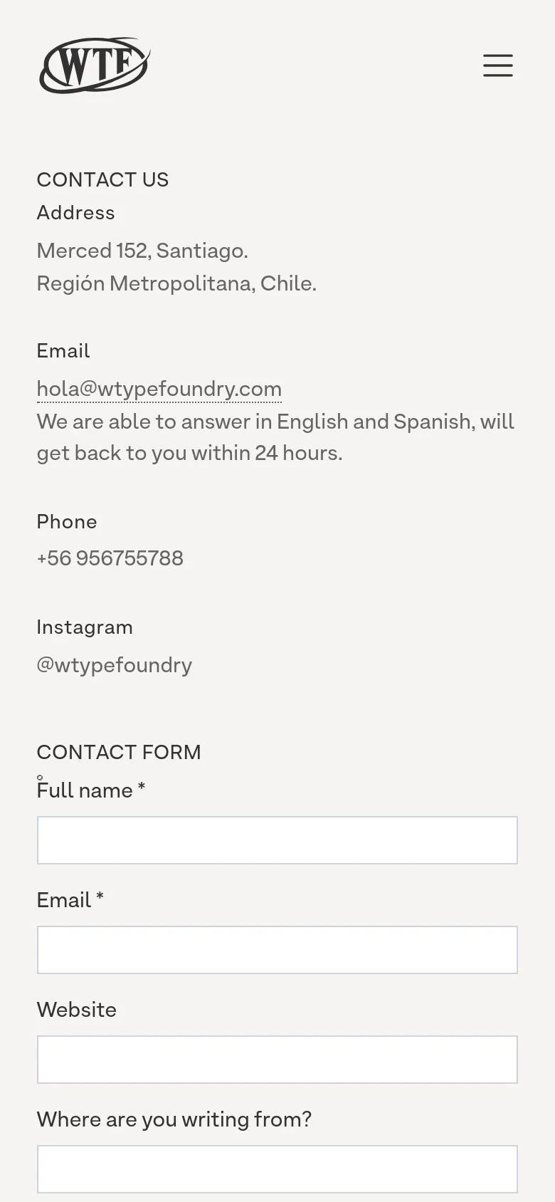 The mobile version presents a single-column vertical layout with a simplified header featuring the WTF logo and a hamburger menu icon. Contact information and the contact form are stacked vertically, making the text and input fields full-width for easier scrolling and interaction on a smaller screen.