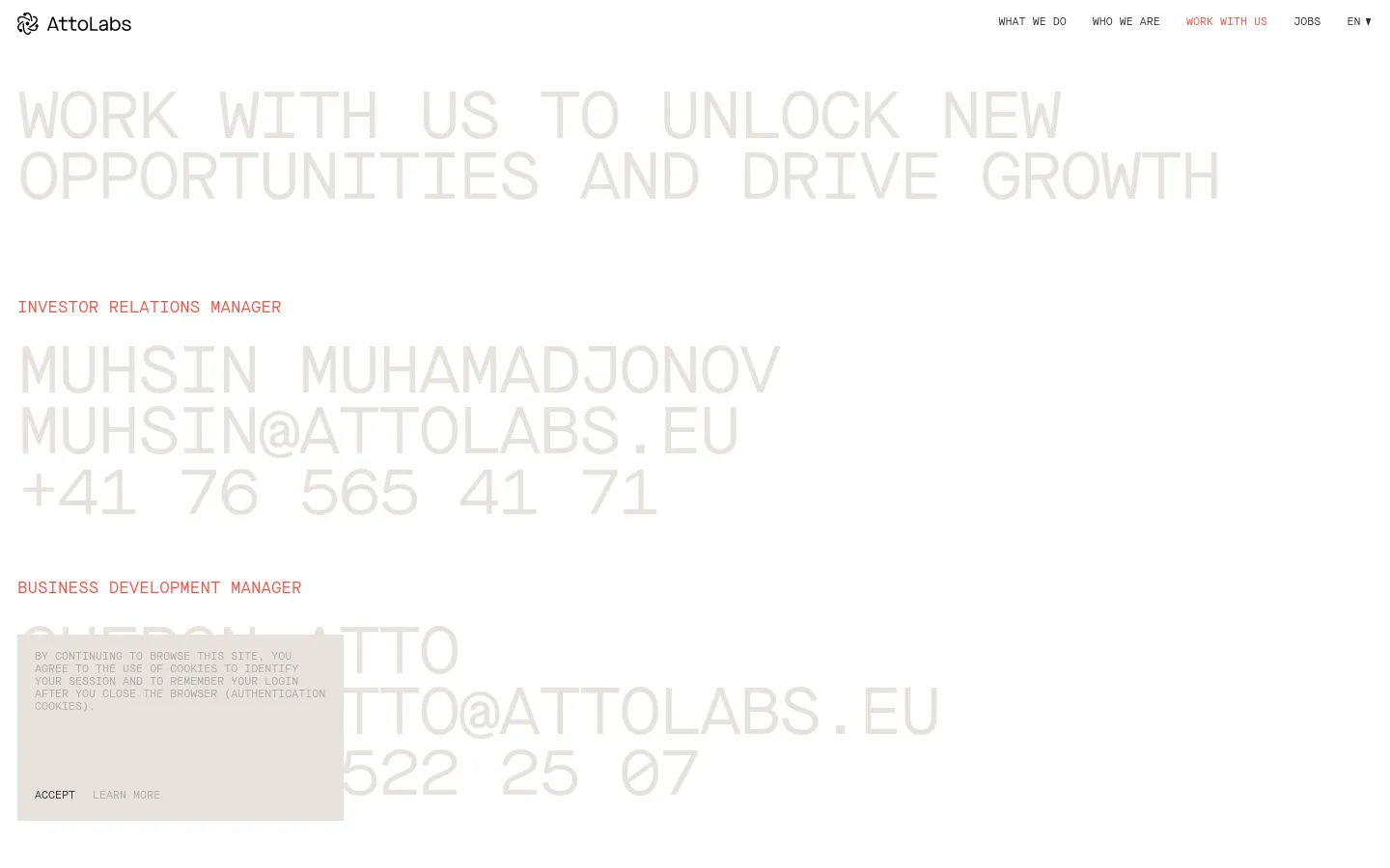 The desktop page features a minimalist design with a dark background and large, light-colored typography. A hero headline reads 'WORK WITH US TO UNLOCK NEW OPPORTUNITIES AND DRIVE GROWTH,' followed by contact sections for an Investor Relations Manager and a Business Development Manager, including names, emails, and phone numbers. The navigation bar at the top includes links for 'What we do,' 'Who we are,' 'Work with us,' and 'Jobs.'