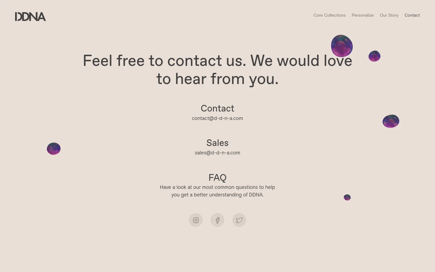 The desktop contact page features a minimalist design with a light beige background and dark text. A large headline reads 'Feel free to contact us. We would love to hear from you,' followed by contact email addresses for Contact and Sales, and a link to the FAQ. Floating iridescent purple spheres are scattered across the layout, and social media icons are centered at the bottom.