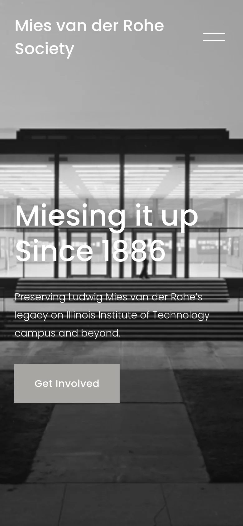 The mobile version presents a vertically stacked layout with the same black-and-white architectural hero image. The 'Mies van der Rohe Society' title and a hamburger menu icon are at the top, while the main headline, mission statement, and 'Get Involved' button are centered over the image.